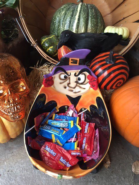The witch’s candy bowl is filled with candy that’s not so popular around our house.